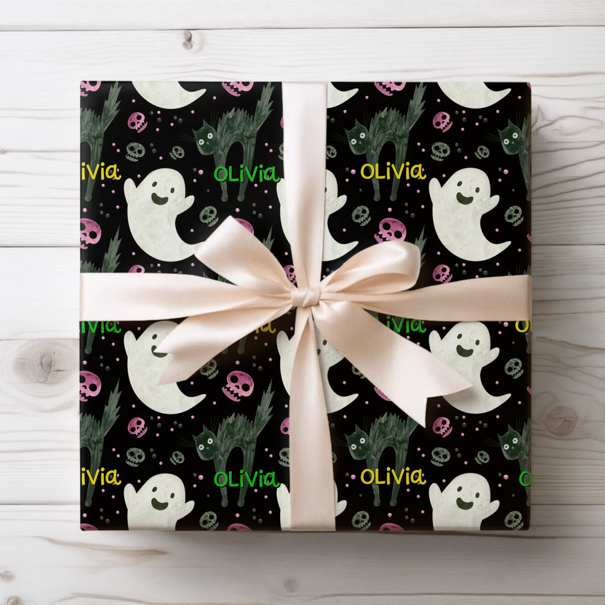 Custom name gift wrap paper for Halloween presents and October birthday gifts