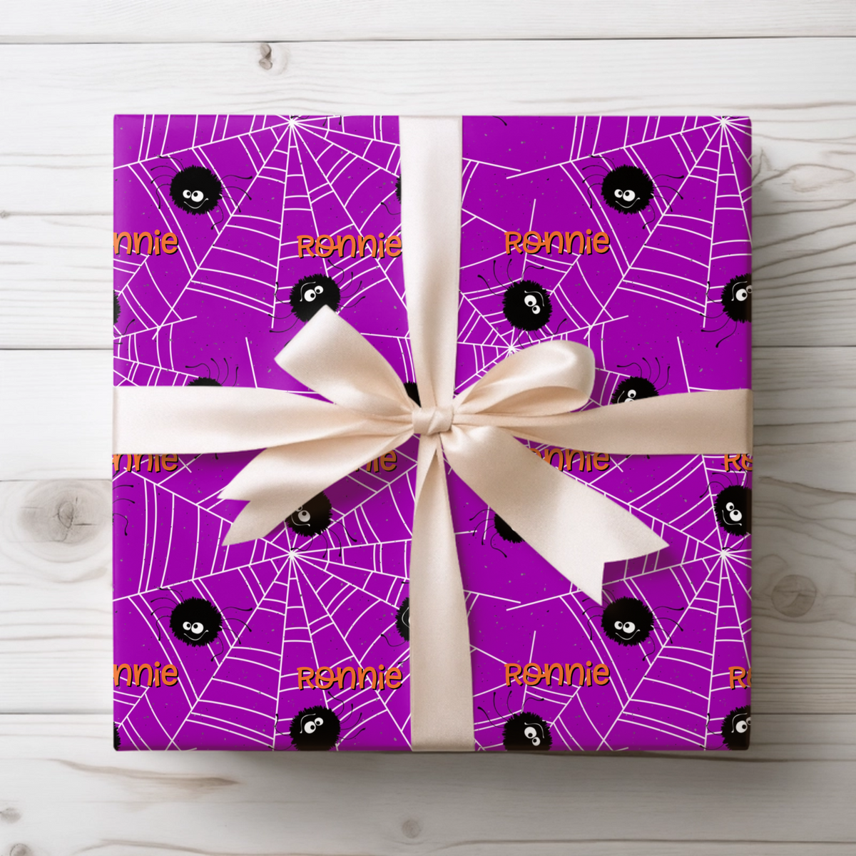 Custom Halloween wrapping paper with name for spooky gifts and October birthdays